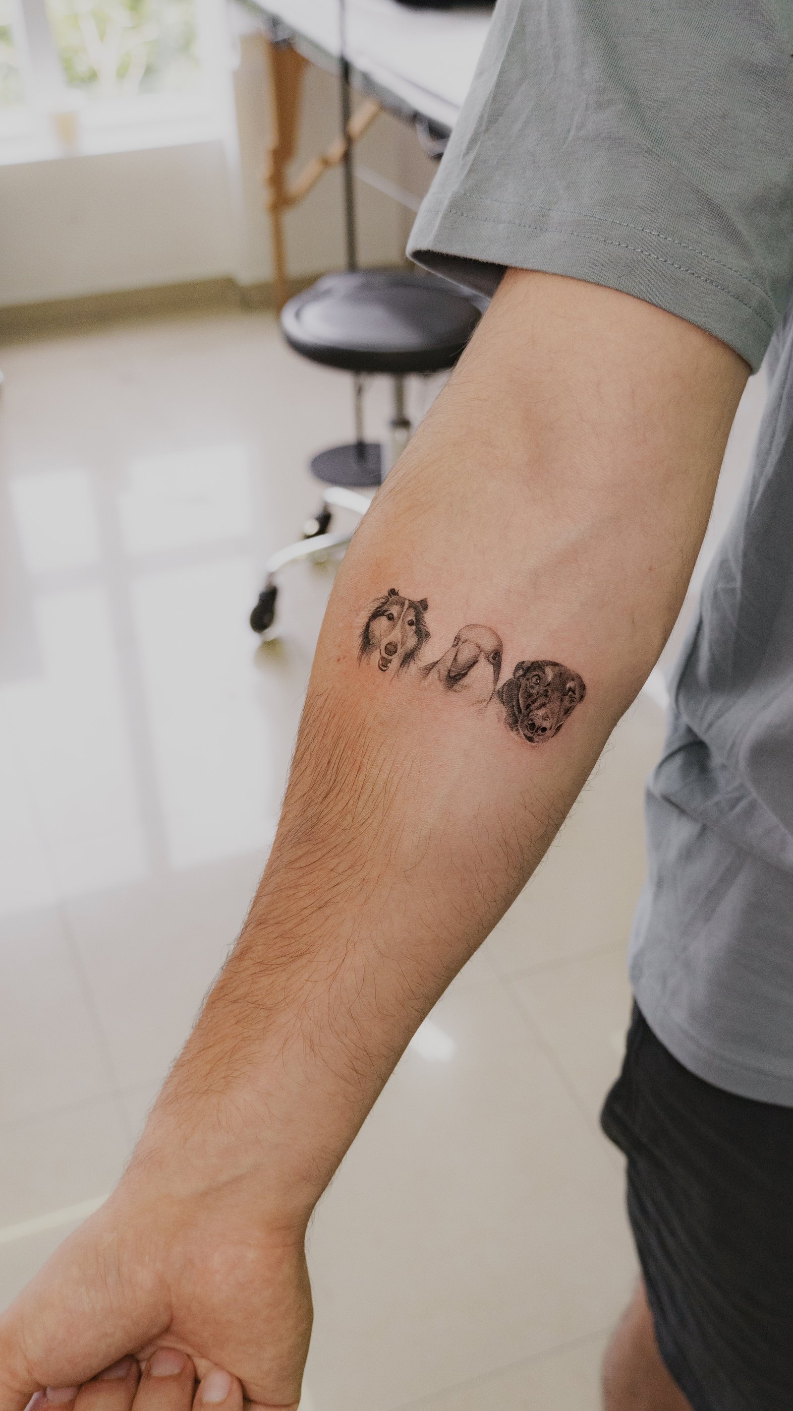 Photorealistic dog portrait tattoo, fine line detail